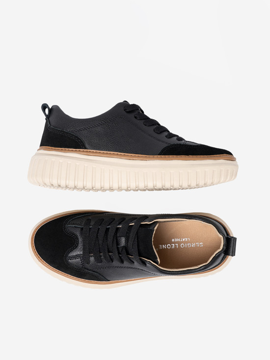 Schwarze Leder-Sneakers auf beiger Plattform