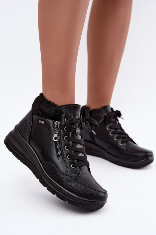 Schwarze Keilabsatz-Stiefelette mit Fellfutter