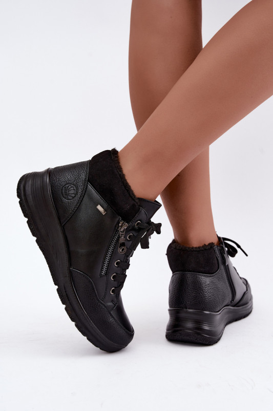 Schwarze Keilabsatz-Stiefelette mit Fellfutter