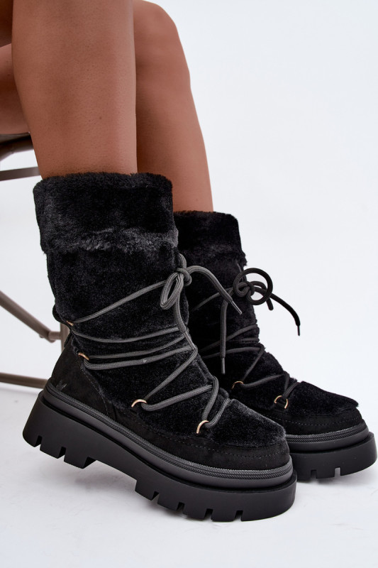 Schwarze Schneestiefel mit Fellbesatz und Plateausohle