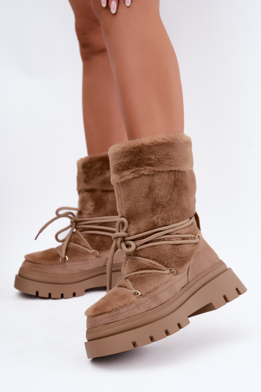 Beige Schneestiefel mit Fellbesatz auf Plateausohle