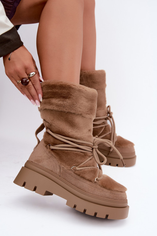 Beige Schneestiefel mit Fellbesatz auf Plateausohle
