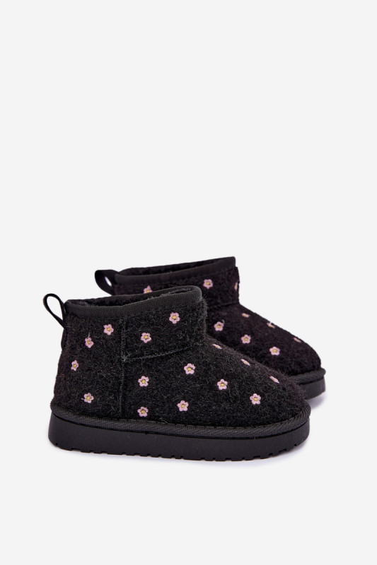 Schwarzer Schneestiefel mit kleinen Blumen und Fell