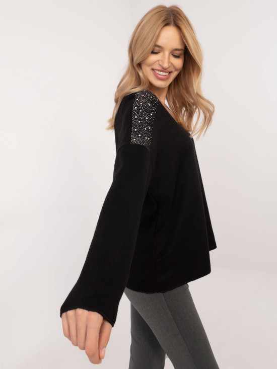 Eleganter schwarzer Pullover mit Applikation