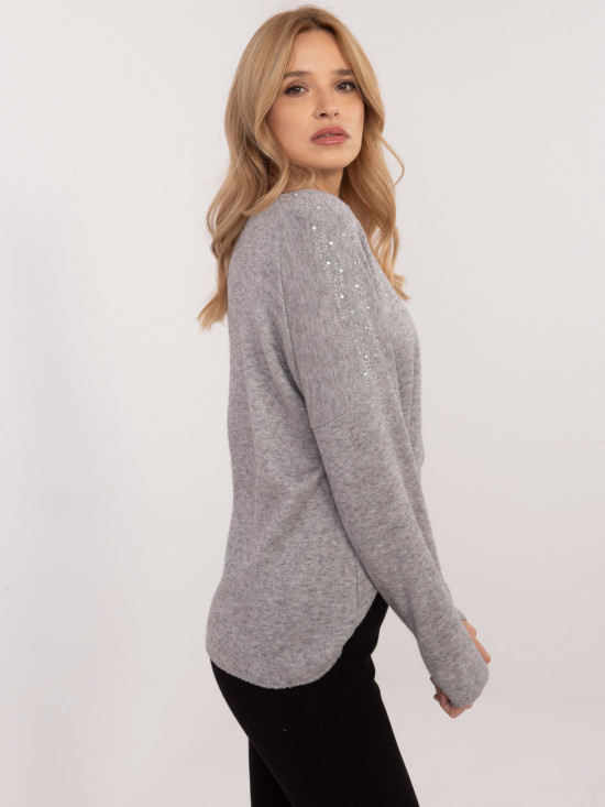 Eleganter grauer Pullover mit Applikation