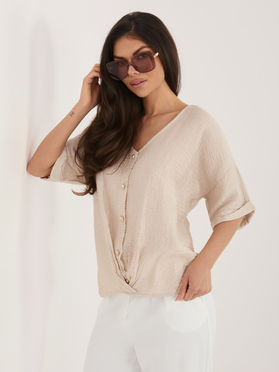 Beigefarbene Bluse mit V-Ausschnitt und strukturierter Oberfläche