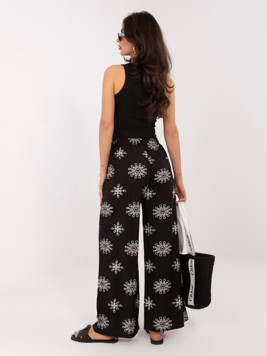 Schwarze Palazzo-Hose mit Gürtel und Print