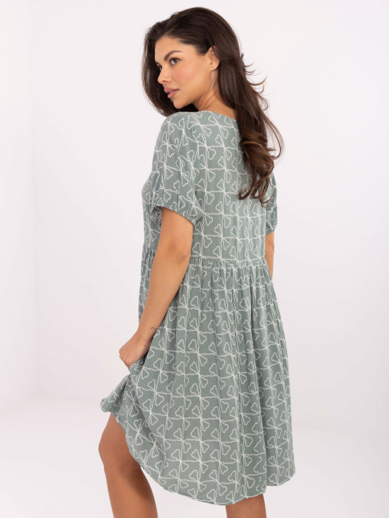 Pistazienfarbene ausgestellte Kleider