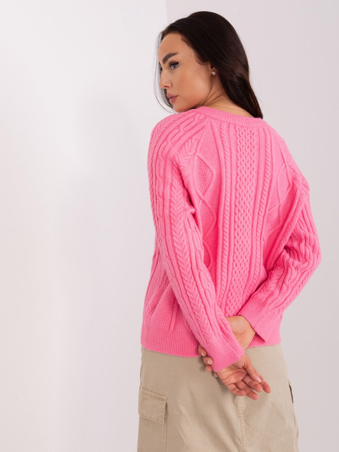 Rosa Strickjacke mit Knöpfen