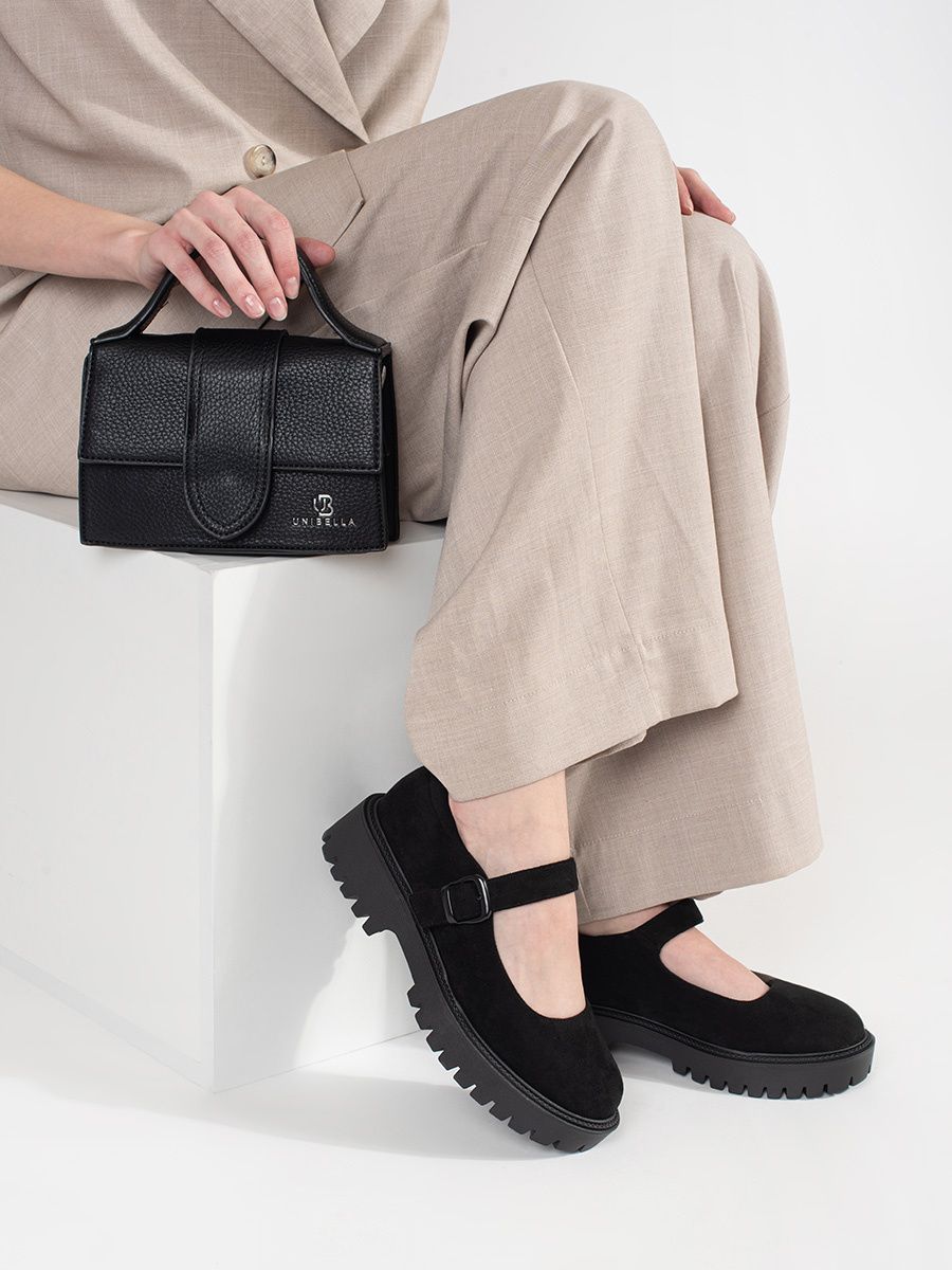 Schwarze Wildleder Slipper mit Plattform