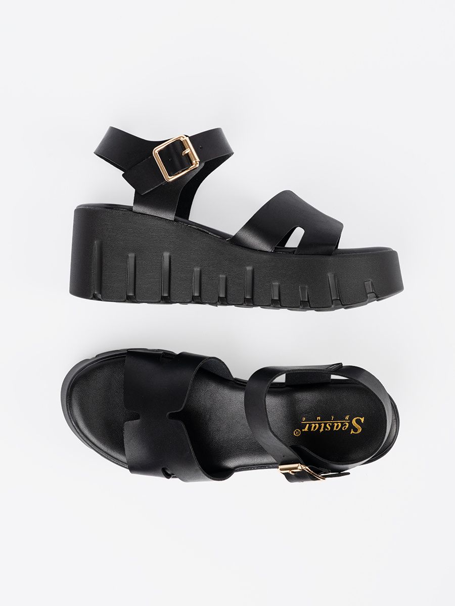 Schwarze Sandalen mit hoher Plattform