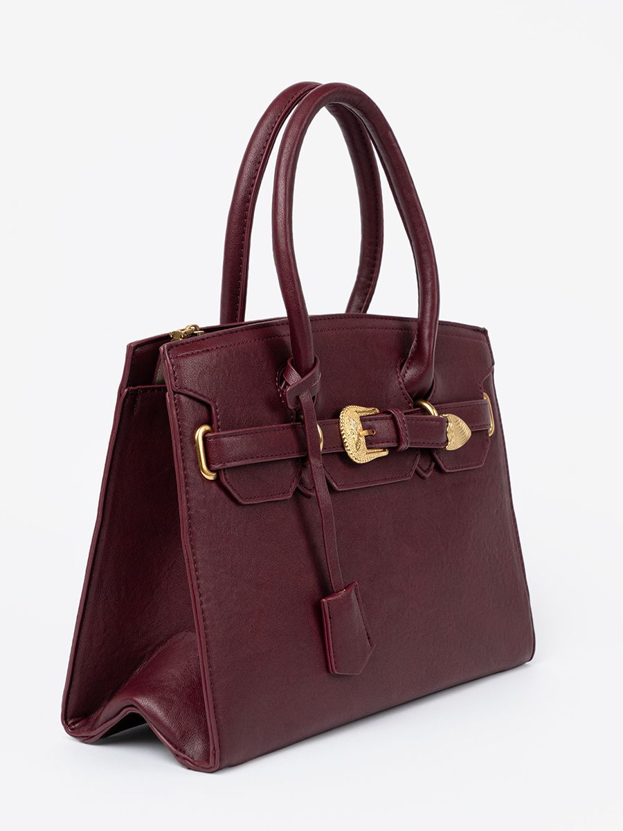 Bordeauxfarbene Handtasche mit dekorativer goldener Schnalle