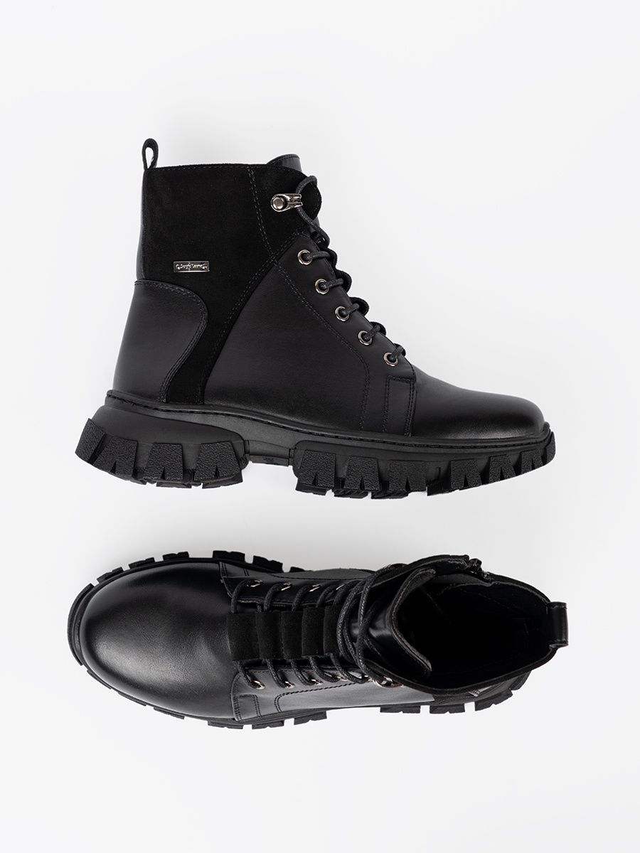 Schwarze Stiefeletten mit massiver Sohle und Reißverschluss