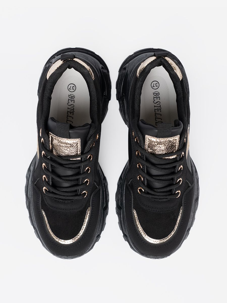 Schwarze Sneakers mit goldenem Herzen
