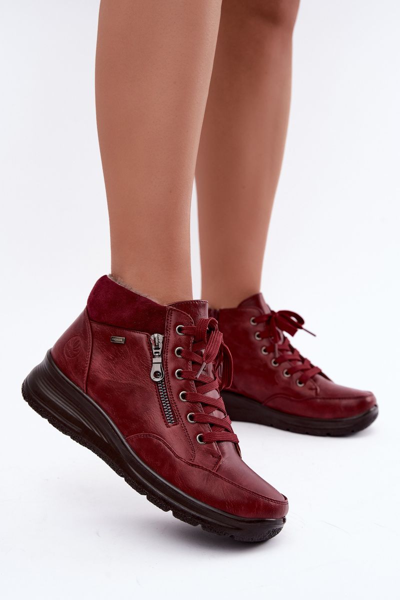 Rote Ankle Boots aus Kunstleder mit Keilabsatz und Fellfutter