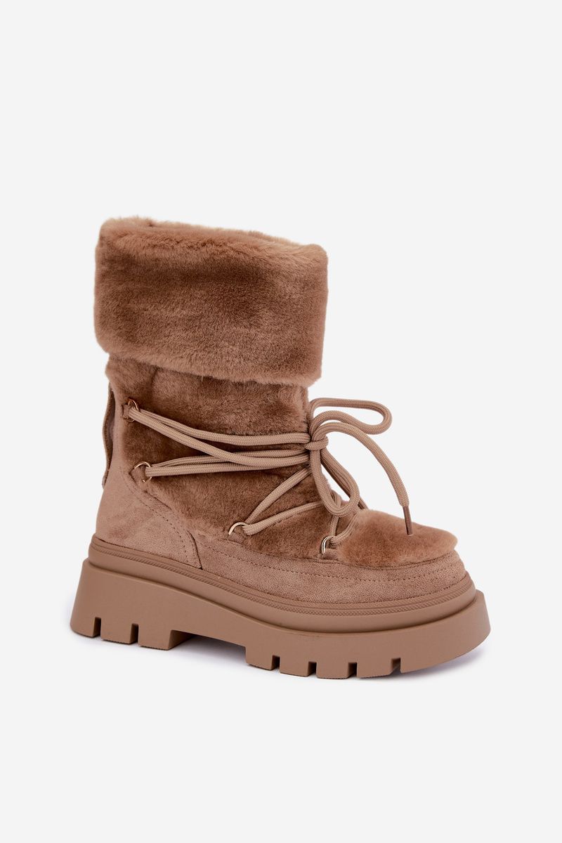 Beige Schneestiefel mit Fellbesatz auf Plateausohle