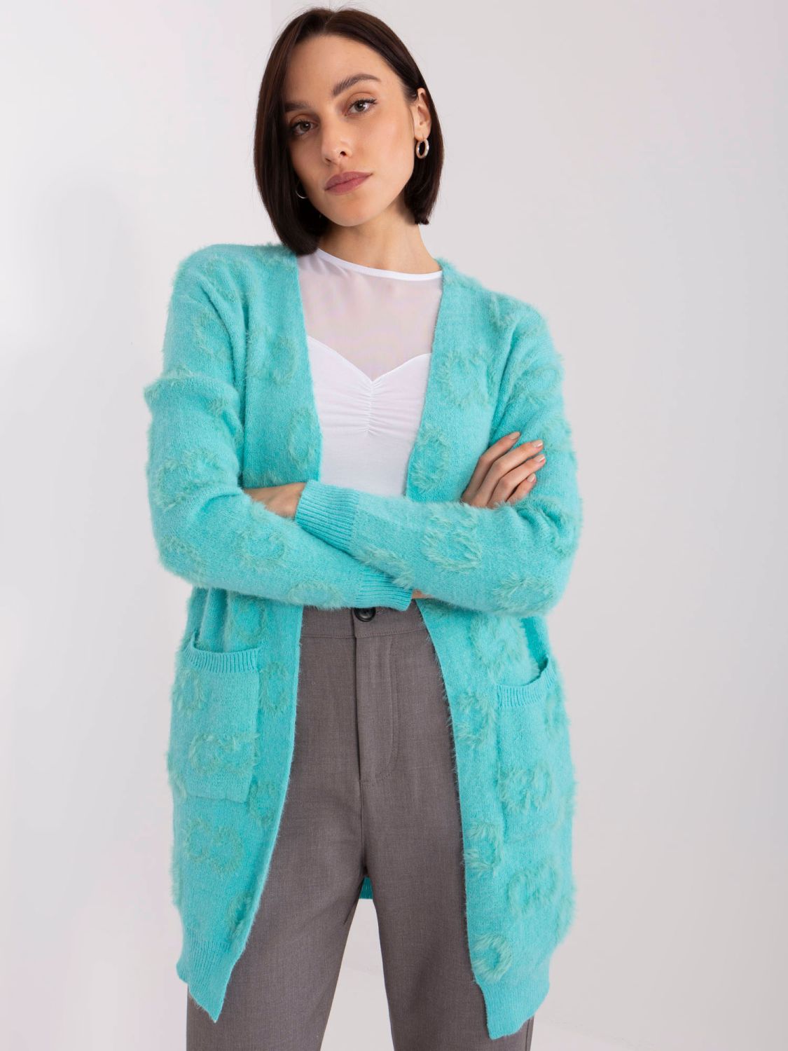 Minzfarbener Cardigan mit Muster