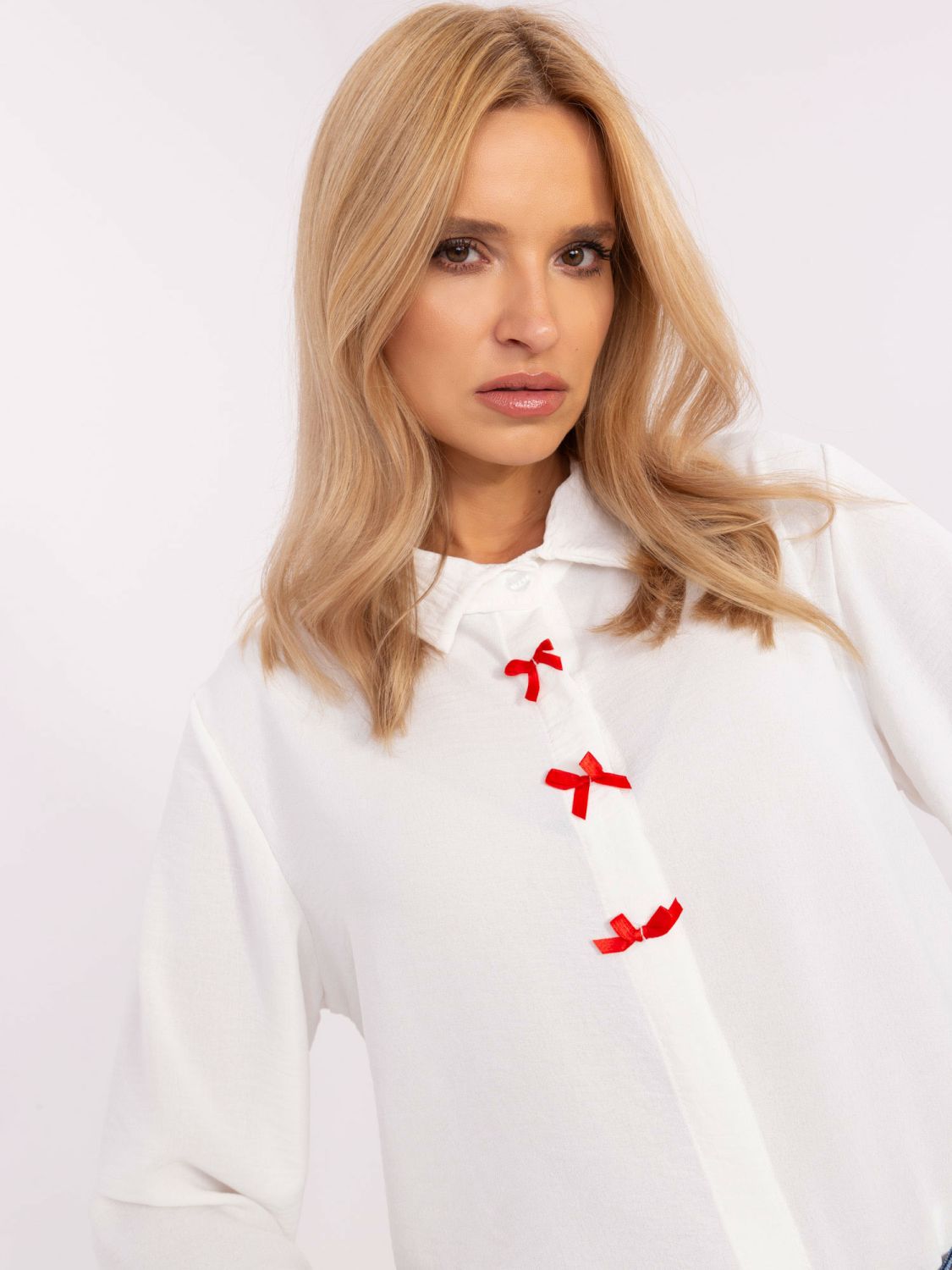 Elegante ecru Bluse mit Schleife