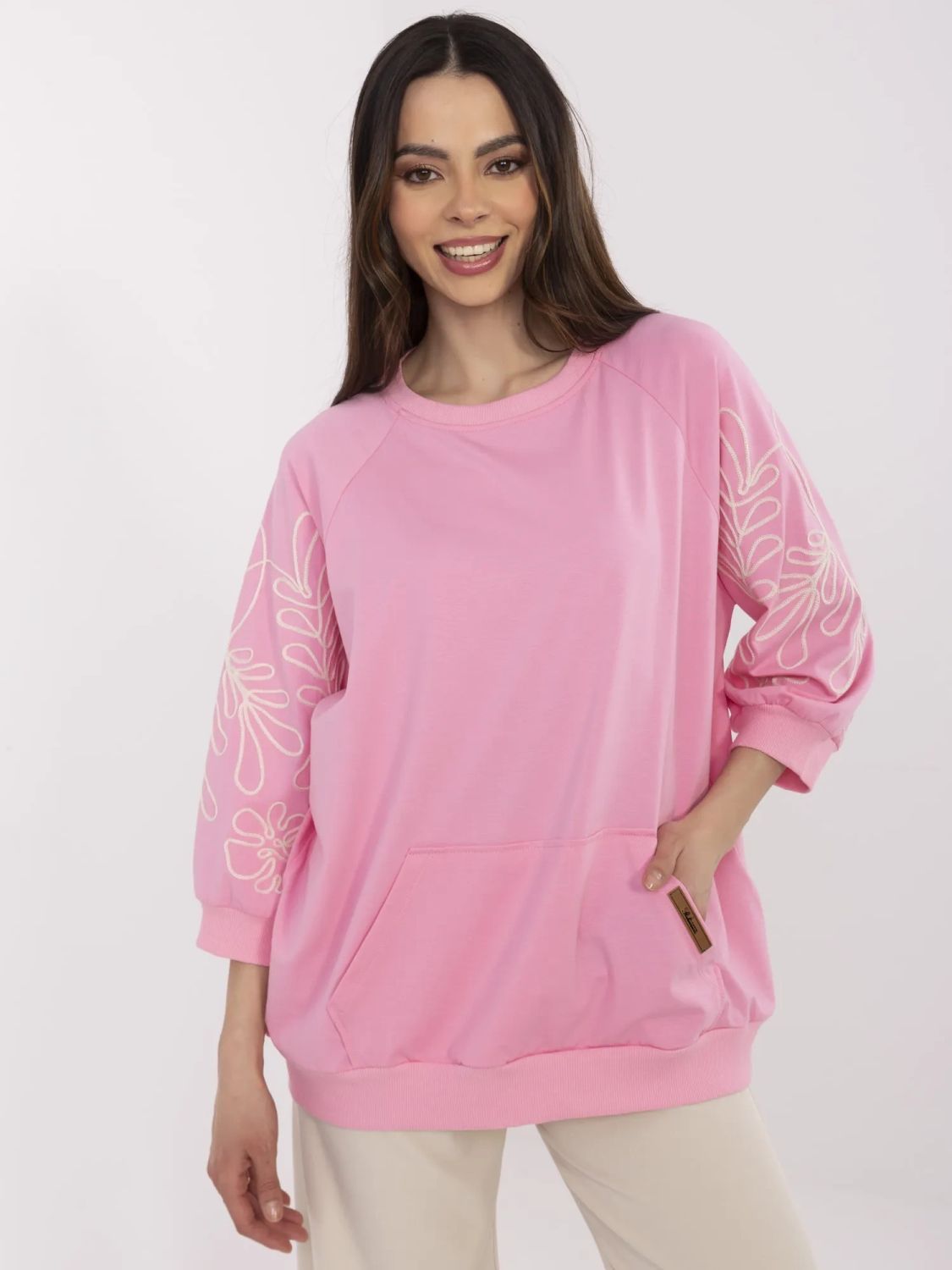 Rosa Bluse mit modernem Schnitt