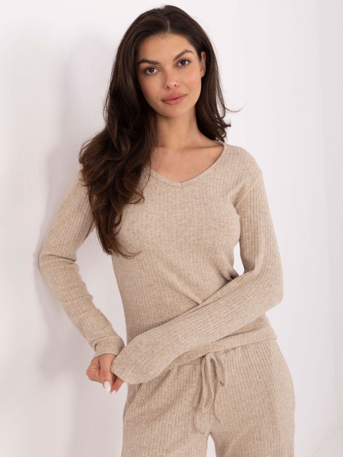 Beige weite Strickhose mit hohem Bund