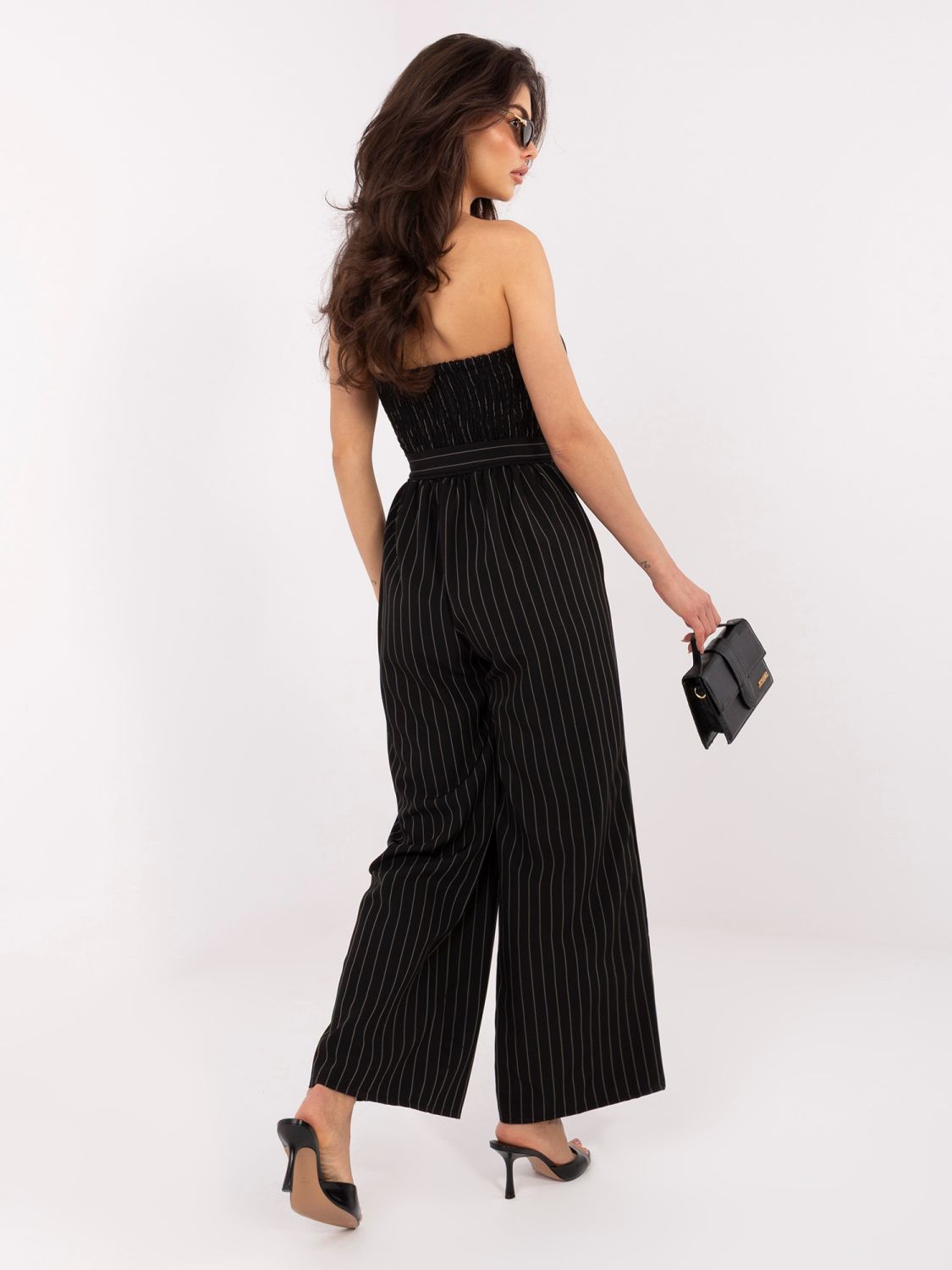 Schwarzer gestreifter Jumpsuit mit Gürtel und weitem Bein