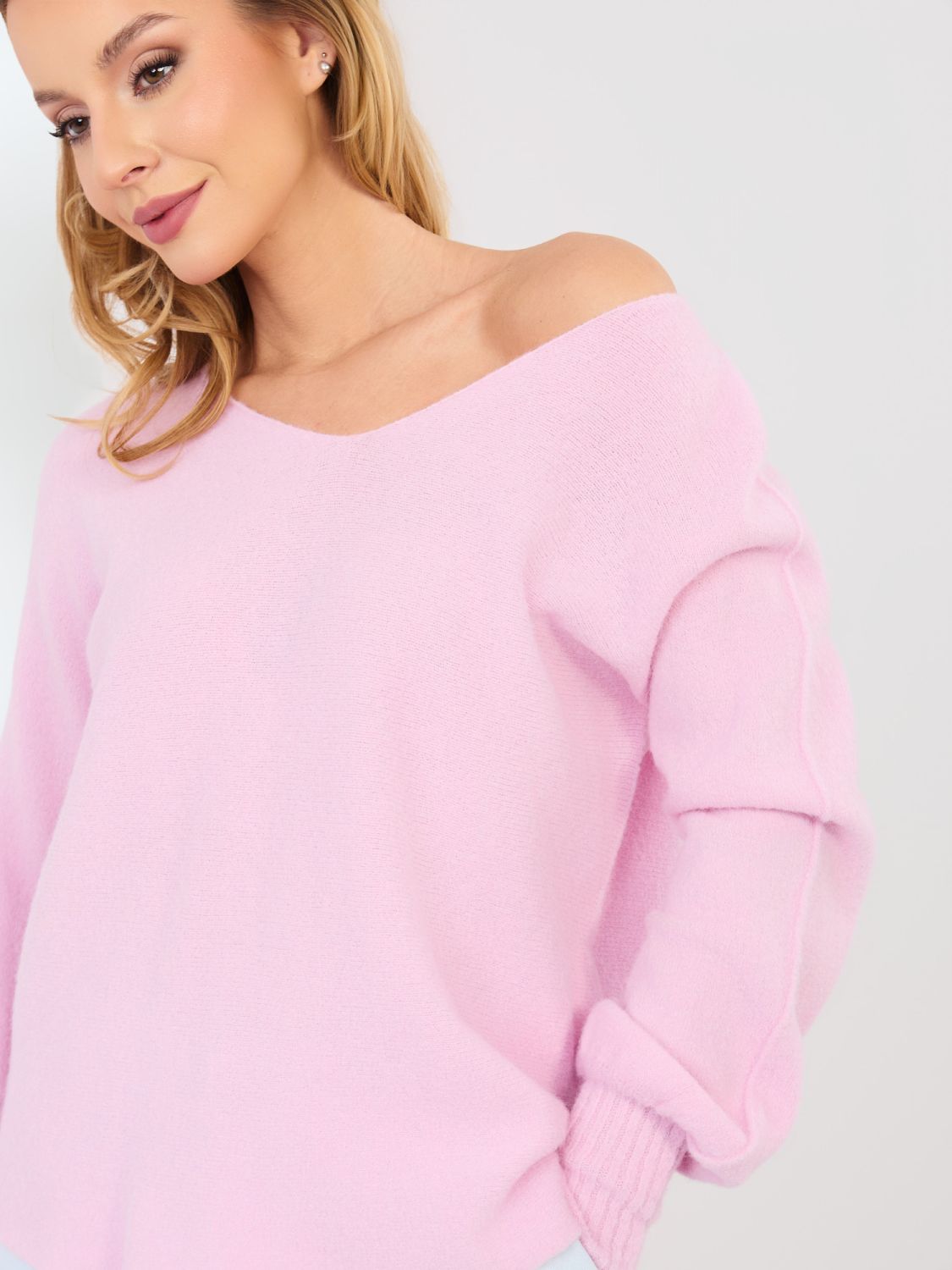 Rosa Strickpullover mit V-Ausschnitt