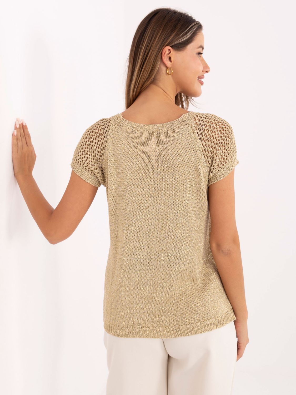 Elegante goldene Bluse