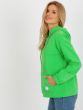 Grüne Sweatshirt mit Kapuze und Aufnäher