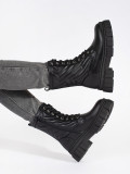 Schwarze Stiefeletten mit gestepptem Muster