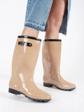 Beige hohe lackierte Gummistiefel