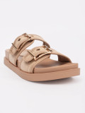 Beige flache Sandalen mit Schnallen