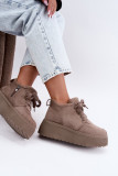 Snowboots mit Lammfell und Plateausohle beige