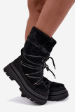Schwarze Schneestiefel mit Fellbesatz und Plateausohle
