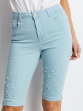 Mintfarbene Shorts mit Perlen