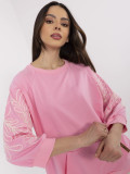 Rosa Bluse mit modernem Schnitt