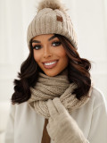 Beiges Winterset mit Bommel