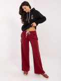Bordeauxrote Sweatpants mit weitem Bein