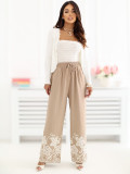 Beige weite Hose mit Stickerei