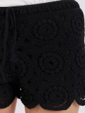 Schwarze luftige Shorts mit Spitzenmuster