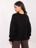 Schwarzer Cardigan mit Volant