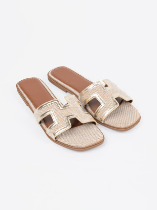 Goldene Slipper mit flachem Absatz