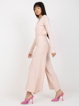 Helle rosa weite Strickhose